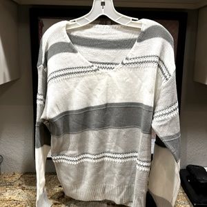 Brand new, hasn’t been worn. Good quality, very soft.